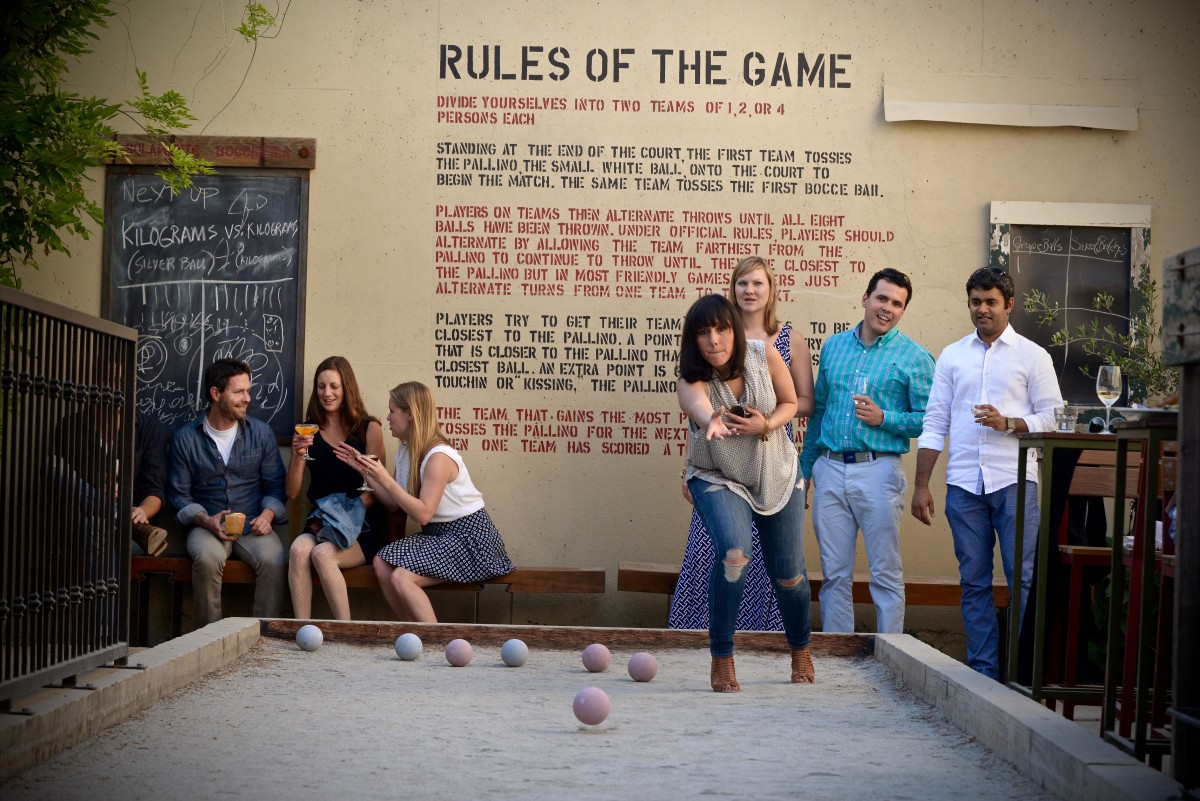 Enjoy a game of bocce between courses at Campo Fina in Healdsburg. (Erik Castro / The Press Democrat)