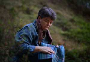 Marilyn Webster with some of her handwoven cloths at her home in Forestville, California. September 26, 2013 (Photo: Erik Castro/for The Press Democrat)