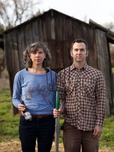 Ellen Cavalli and Scott Heath, striking their best "American Gothic" pose, are in the second year of production of their Tilted Shed Ciderworks, north of Sebastopol. (photo by Christopher Chung)