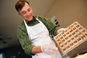 Guy Daniels with Gandolf's Fine Chocolates prepares his boutique truffles in Santa Rosa. (photo by Conner Jay)