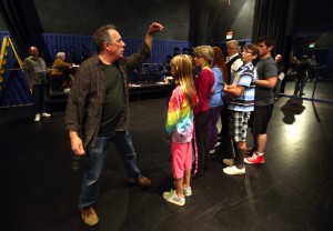 Spreckels Center for the Arts Managing Director, Gene Abravaya directs actors in their production of "Scrooge," a musical based on "A Christmas Carol." (photo by John Burgess)