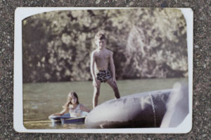 Don McEnhill Jr. in 1970 at age 7, and his sister, Marilyn, 9, are poised to float to Del Rio Woods Beach from a quarter-mile upstream. (Courtesy Don McEnhill)