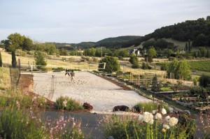 The 5-acre property had plenty of space for a sand volleyball court next to the produce garden’s raised beds.