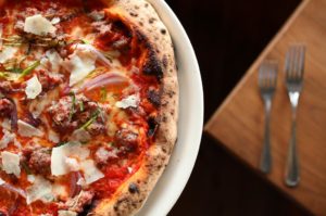 The Salsiccia Pizza, containing house sausage, red onions, and pecorino, at Diavola Pizzeria & Salumeria, in Geyserville. (Christopher Chung/ The Press Democrat)