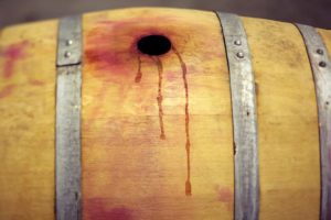 Spilled wine stains a barrel at Punchdown Cellars in Santa Rosa on Thursday, July 17, 2014. (Conner Jay/The Press Democrat) 