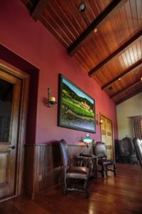 Dining room with ceiling and wainscoting made from old redwood barrels from Sebastiani winery.