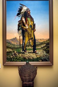 American Indian painting and antique wine bottle in the entry way of the Sebastiani home. 