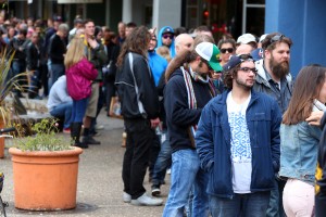 Customers wait in line for hours along Fourth Street in downtown Santa Rosa for the 2014 release of Pliny the Younger at Russian River Brewing Company. (Christopher Chung/ The Press Democrat)