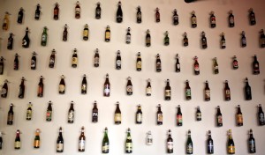 Bottles of beer on the wall at Woodfour Brewing Company. (Crista Jeremiason)