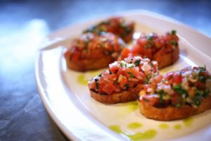 Bruschetta all'Aglio, Pomodoro e Basilico is served at Baci Cafe & Wine Bar in Healdsburg. (Photo by Conner Jay)