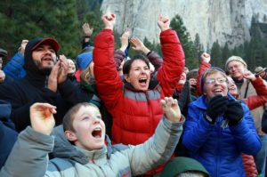 Gaelena Jorgeson, center in red, of Santa Rosa celebrates as her son, Kevin, completes the first free climb of El Capitan in the Yosemite Valley on Wednesday. Terry Caldwell, right, mother of Jorgeson's climbing partner Tommy Caldwell, and her grandson Grant Van Nieuwenhuysen, 12, join the jubilation in the meadow. (John Burgess / The Press Democrat)