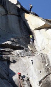 Tommy Caldwell, in yellow, leads Kevin Jorgenson, in red, of Santa Rosa, on the final pitch of their free climb of El Capitan in the Yosemite Valley with on January 14, 2015. (Photo by John Burgess/The Press Democrat)