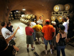 Patrick Schieglich leads a tour of the wine caves at Benziger Family Winery. (Photo by Scott Manchester)