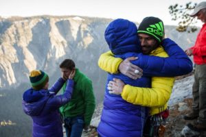 From left: Becca and Tommy Caldwell, and Jacqui Becker and Kevin Jorgeson embrace after the two men completed a free climb summit of the Dawn Wall of El Capitan, in Yosemite National Park, Calif., Jan. 14, 2015. Using ropes as a safety measure only, the duo became the first to climb by hand the 3,000-foot granite wall, an ascent they began on Dec. 27. (Max Whittaker/The New York Times)