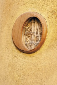 A glimpse into the straw wall interior of the home.