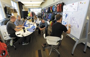 A design team discusses new ways to engineer water reservoirs at the offices of CamelBak in Petaluma. 