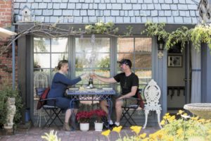 Shanon Johnson and her husband, Eric, of Seattle, celebrate their wedding anniversary in a cottage behind the home of Sandy and Bud Metzger. The cottage, located in a historic Santa Rosa neighborhood, is offered through Airbnb. (photo by Jeremy Portje)