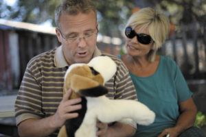 Danny Miller, who carries a plush dog named Tom everywhere he goes at Sonoma Developmental Center, arrived at Eldridge in 2000. His mother, Kathleen, right, worked as a psychiatric social worker at SDC.