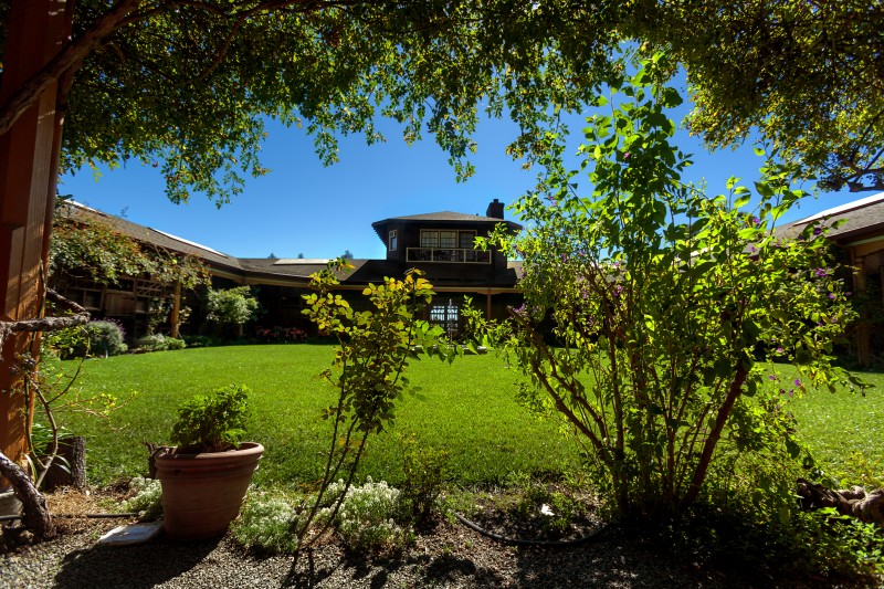 Rancho Wikiup, a converted horse stable, now a bed and breakfast, and owner Nancy Guevara Inner courtyard with lawn and tower bedroom in back Chris Hardy