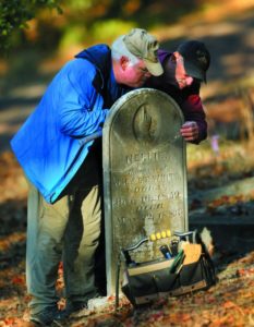 A cadre of volunteers uses elbow grease and detective work to locate old tombstones.