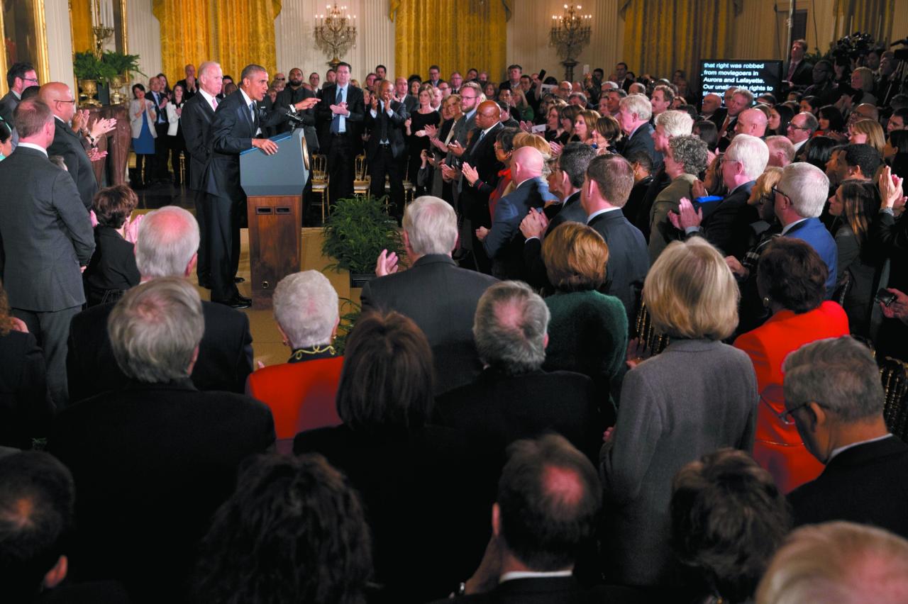 Thompson is part of the crowd that stands and applauds as President Barack Obama speaks in the East Room of the White House on Jan. 5, 2016. He outlined steps his administration is taking to reduce gun violence. Among those onstage are people whose lives have been impacted by gun violence. (Jacquelyn Martin/Associated Press)