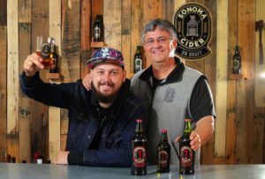 Sonoma Cider founders Robert Cordtz, left, and his father, David, at their production facility in Healdsburg, on Tuesday, March 1, 2016.   (Christopher Chung/ The Press Democrat)