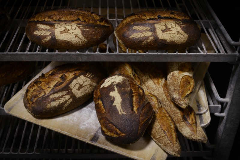 A selection of fresh baked bread by Eli Colvin, owner of Revolution Bread, which he baked during his last day working at The Model Bakery in Napa. February 28, 2015 (Photo: Erik Castro/for The Press Democrat)