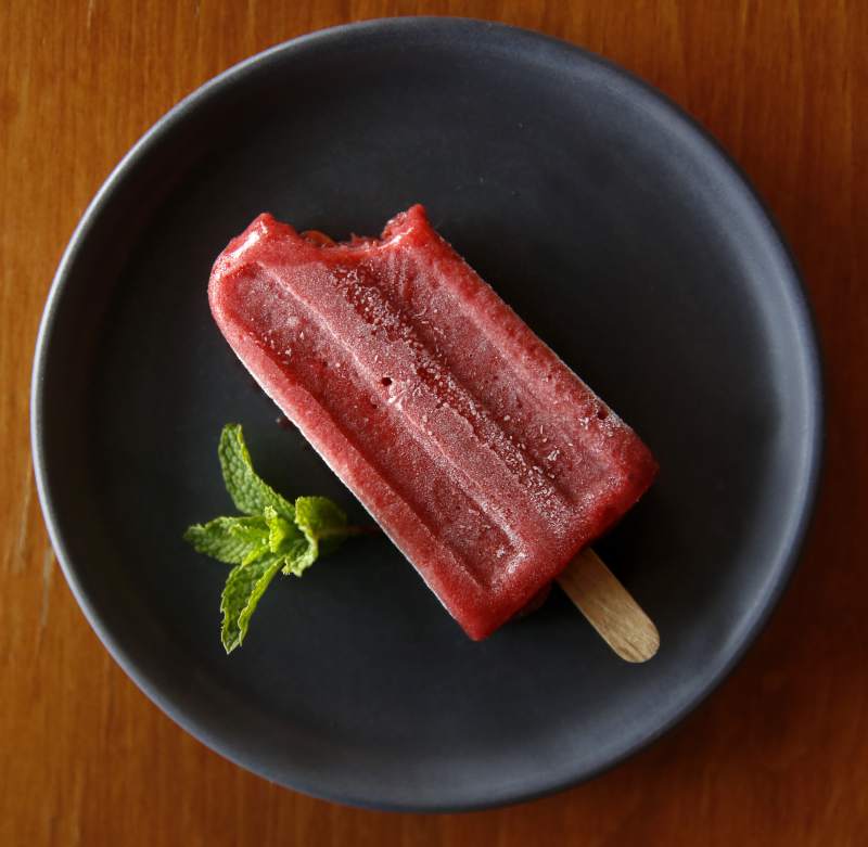 A housemade strawberry popsicle at The Kenwood Restaurant. (Beth Schlanker / The Press Democrat)