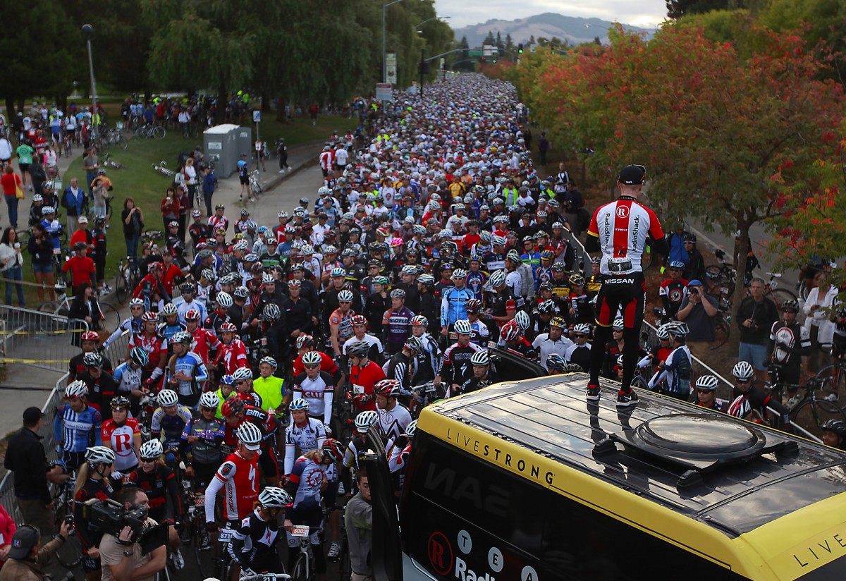 Levi Leipheimer of Santa Rosa prepares to talk to over 7500 bicycle riders at the start of his King Ridge Gran Fondo. (Kent Porter / Press Democrat)