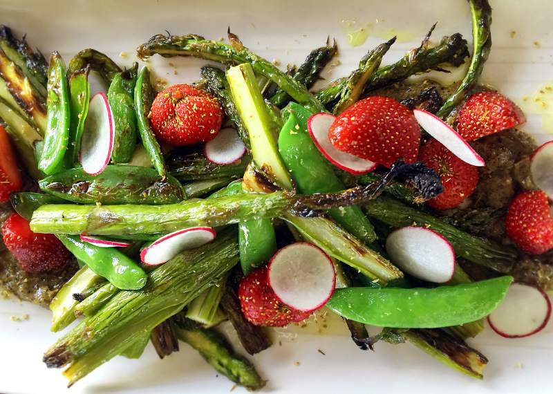 Roasted asparagus, snap peas, radish and strawberries at Vignette Pizzeria in Sebastopol. (Heather Irwin / The Press Democrat)