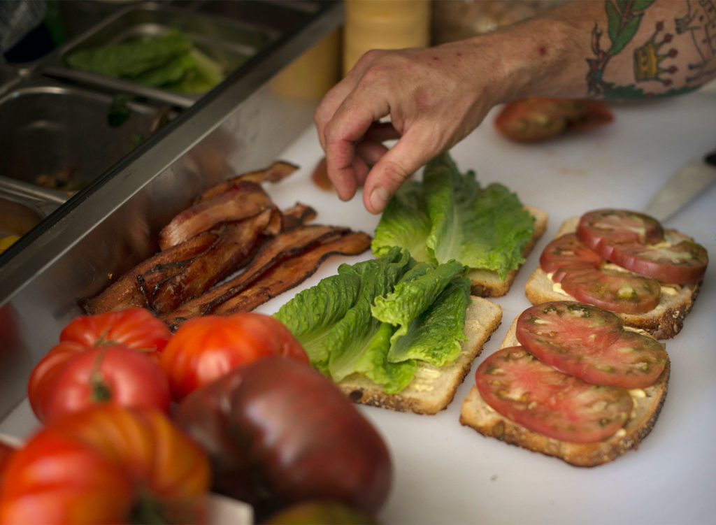 Prepping BLTs at Davis Family WInery in Healsburg. The Black Piglet opens this week. PD File