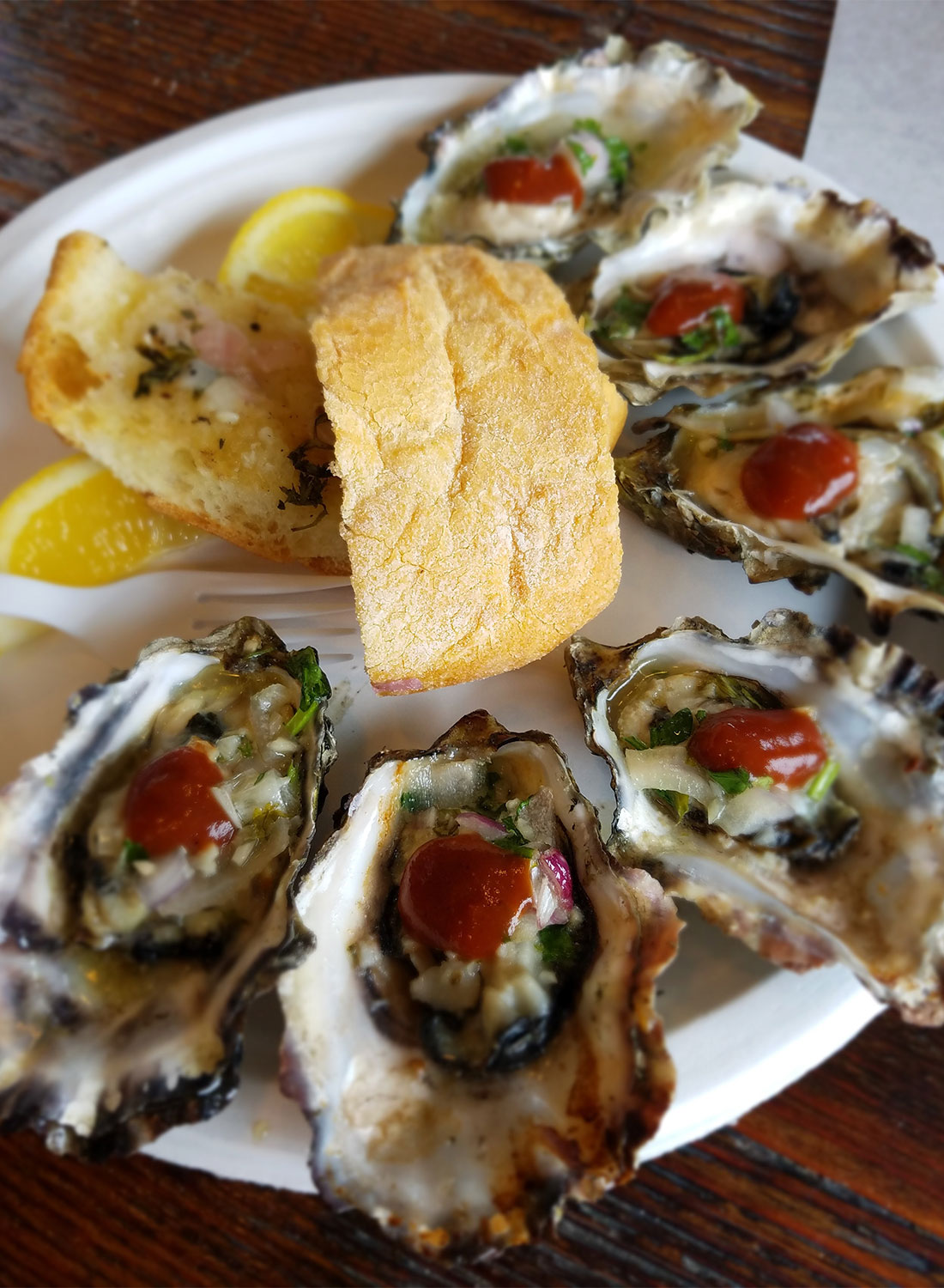 Grilled oysters at Fisherman's Cove in Bodega Bay Sonoma Coast 6/16. Heather Irwin