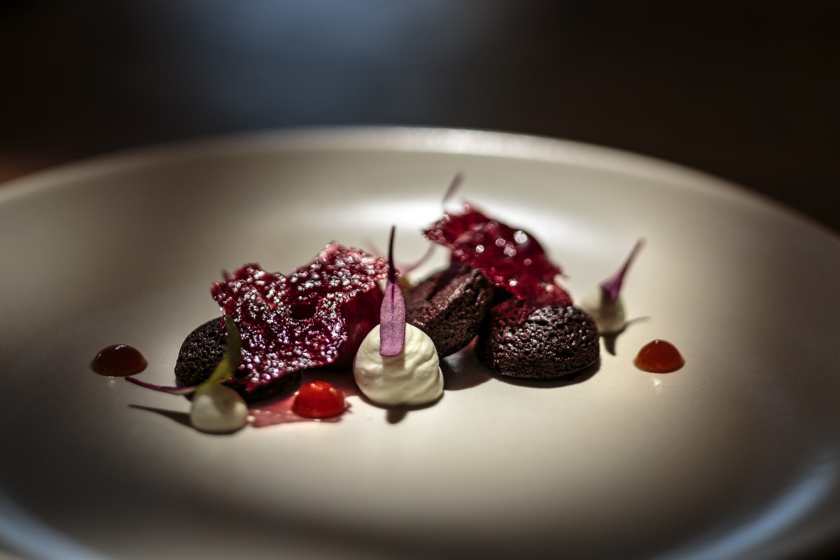 Robert Nieto’s flourless chocolate cake with cherries, pistachio cream, Earl Grey gel and cherry tuile.