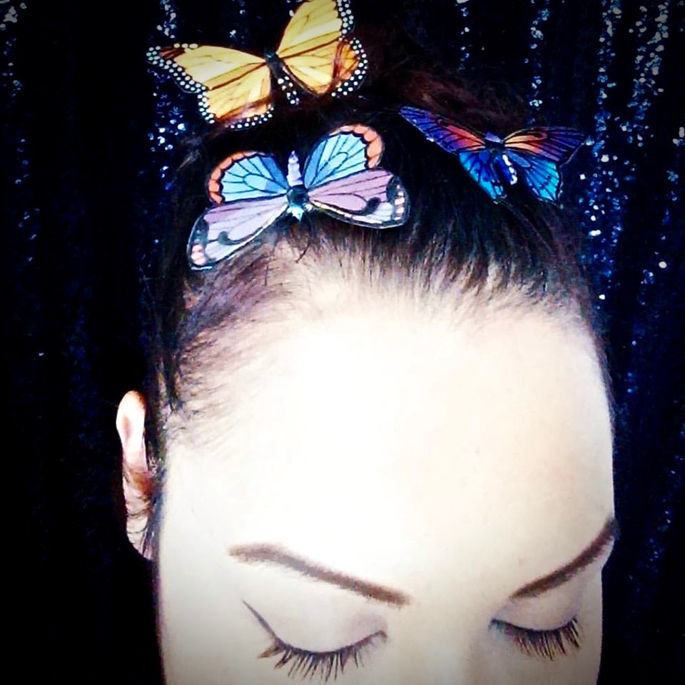 Hand painted locally, these butterflies are wearable art.