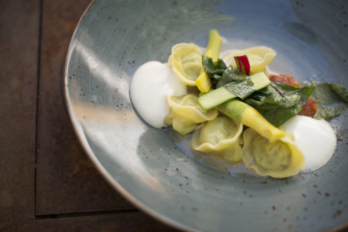 Tortellini filled with braised rabbit and served with heirloom tomatoes, pesto and parmesan foam at Rancho Nicasio Bar and Restaurant in Nicasio, California, August 13, 2016. (Photo: Erik Castro/for The Press Democrat)