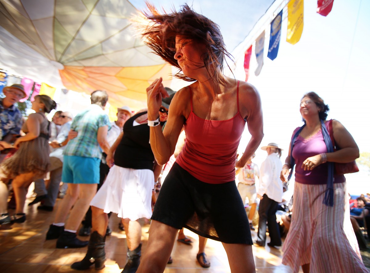Ann Kay of Santa Rosa sways to the music of the Jimmy Breaux & The Cajun Cottonpickers band during Saturday's Cajun Zydeco Music Festival in Sebastopol, September 7, 2013. (Conner Jay/The Press Democrat)