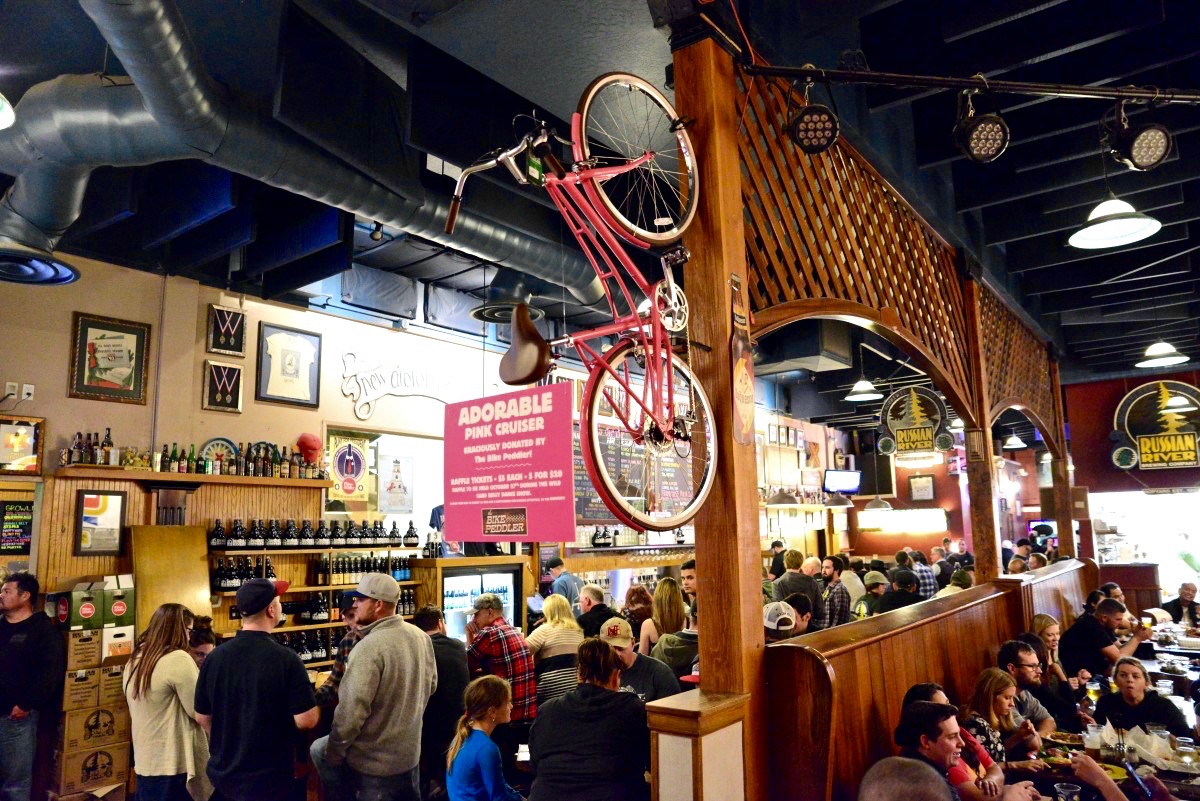 Pink Cruiser donated by the Bike Peddler, hanging in the Russian River Pub for "Hopped Up For The Cure" 2016. (Photo by Tim Vallery)