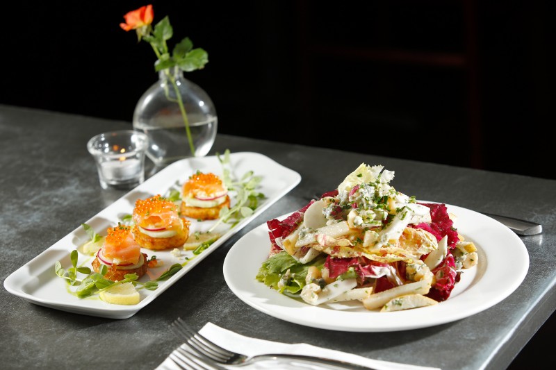 House-cured salmon on crisp potato cake, left, and salad of chicories, at Calistoga Kitchen in Calistoga, California on Friday, November 11, 2016. (Alvin Jornada