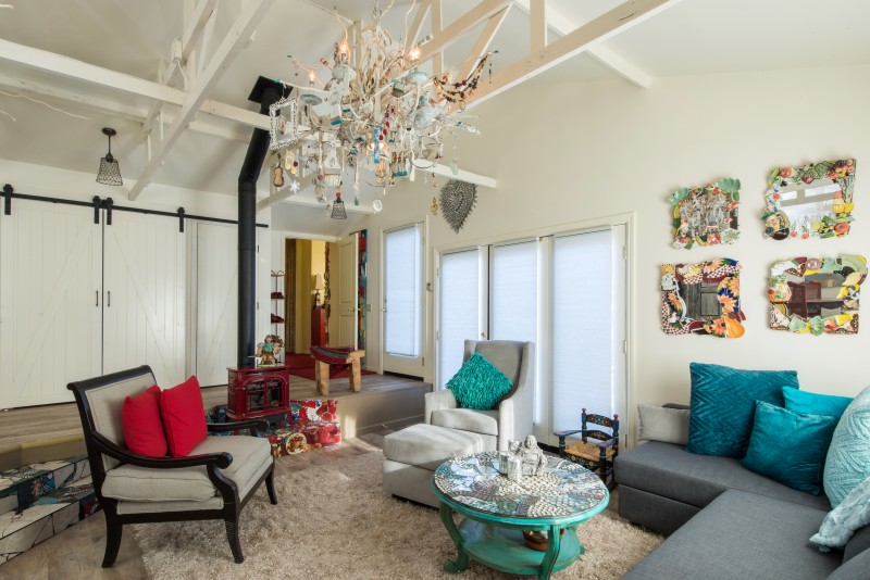 The Watanabes’ artistic touch is everywhere (clockwise from top): their living room; the home’s foyer, which is a shrine to Buddha; and the interior of the Art Chapel.
