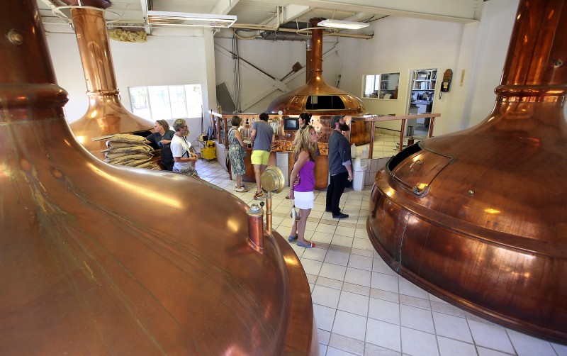 Visitors tour the Anderson Valley Brewing Company on Thursday, August 16, 2013. (photo by John Burges
