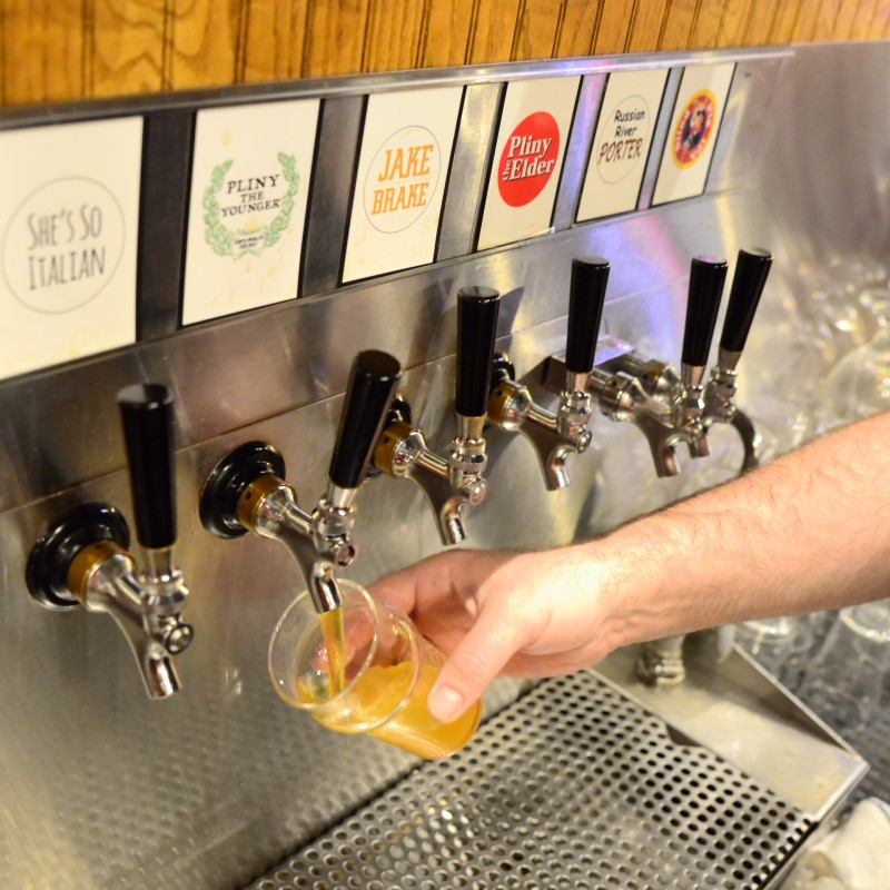 Bartenders pouring hundreds of pints of Younger a day. (Photo by Tim Vallery) 
