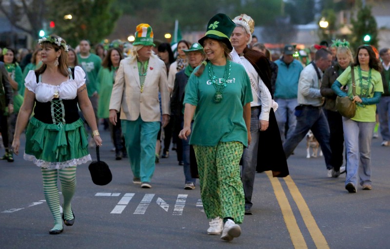 Participants in the St. Patrick's Day parade walk down Healdsburg Ave. in Healdsburg, on Tuesday, March 17, 2015. (BETH SCHLANKER