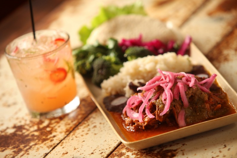 Conchinita Pibil, by Mateo Granados, at Mateo's Cocina Latina in Healdsburg, served with a rhubarb inspired margarita. The dish features slow-roasted pork marinated in annatto seed with homemade tortilla and cinnamon-cured red onions. Christopher Chung