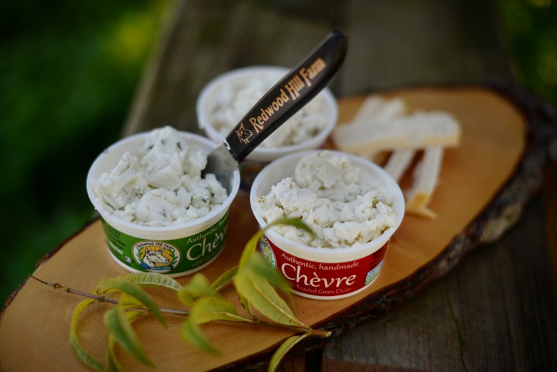 Redwood Hill Farm chvre in three varieties: Garlic Chive, Roasted Chile and Three Peppercorn along with some smoked goat cheddar at their goat farm in Sebastopol. January 27, 2017. (Photo: Erik Castro