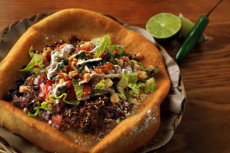 Shredded Chocolate-Coffee Braised Bison Open Face Fry Bread Taco with Calypso Beans, Cotija cheese, Sour Cream, and BBQ Corn-Cranberry-Anaheim-Serrano Salsa at the Werowocomoco restaurant at the Virginia Dare Winery in Geyserville. (John Burgess)