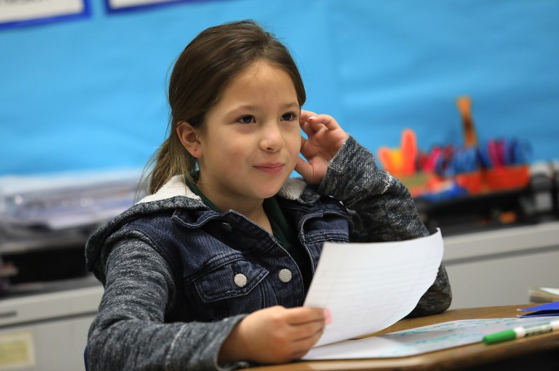 Sarahi Figueroa, 8, reads aloud the ltter she wrote on Inauguration Day to President Donald Trump. her letter. (John Burgess