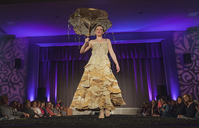 Eden Pieper modeled Susan Heeringa-Pieper's design "Caffeine Couture,' made from used coffee filters and aluminum pop tops, at the Sonoma Community Center's Trashion Fashion Show last Saturday, March 19. High couture made from lowly rubbish graced the catwalk at the Vets Building for an appreciative crowd. (Photos by Robbi Pengelly