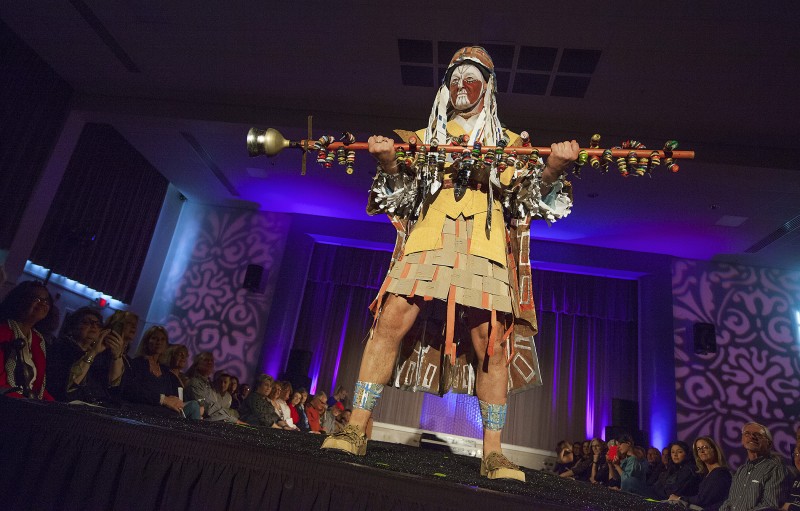 Robert Stickley, who took first prize, modeled his own design - "Remodel Shaman," made from security window envelopes, beer bottle caps, and miscellaneous construction-site detritus - at the Sonoma Community Center's Trashion Fashion Show last Saturday, March 19. High couture made from lowly rubbish graced the catwalk at the Vets Building before an appreciative crowd. (Photos by Robbi Pengelly