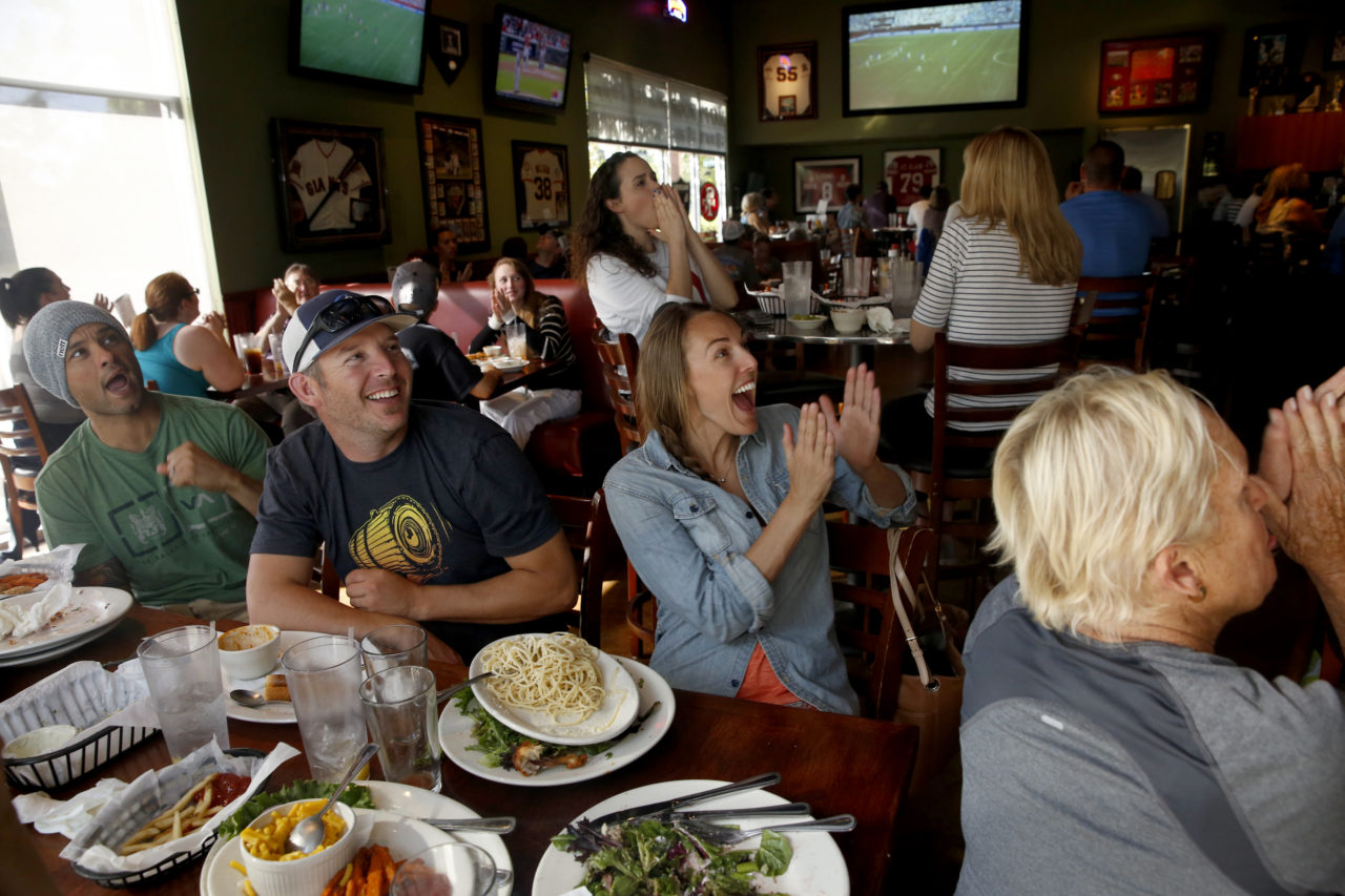 Soccer fans react as the USA plays Japan during the World Cup final at Beyond The Glory Sports Bar and Grill on Sunday, July 5, 2015, in Petaluma.