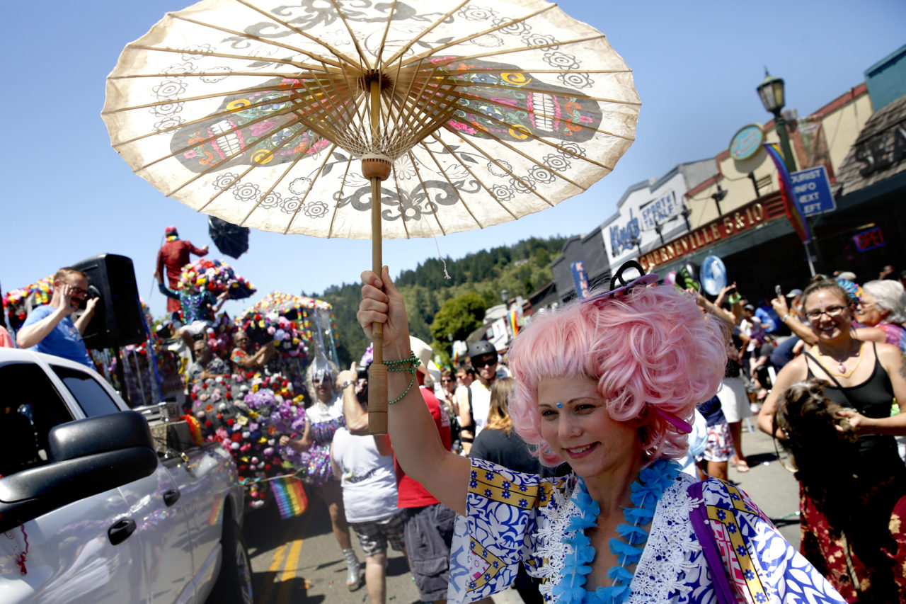 Jennifer Lux dances during the Sonoma County Gay Pride Parade in Guerneville, on Sunday, June 5, 2016. (BETH SCHLANKER/ The Press Democrat)